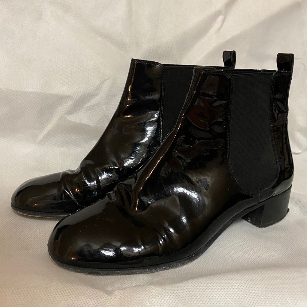 Black patent leather Chanel boots